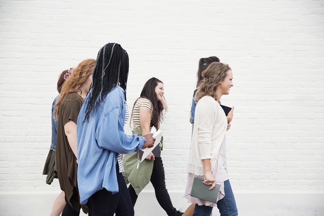 Image of Six Girls Walking To Class for Pregnant in School Page - Oasis Pregnancy Care Centers